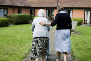 Care Home nurse and elderly lady 