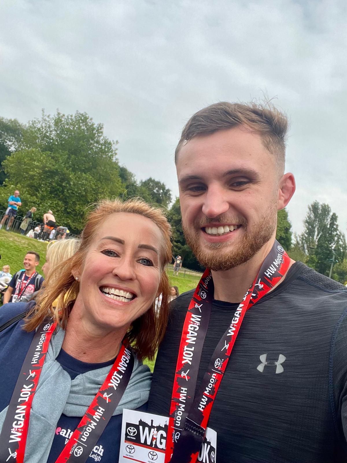 George and Lisa stood next to eachother during the 10k