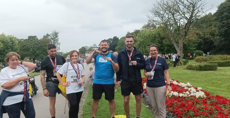 Some of Healthwatch lining up for a photoshoot after the 10k