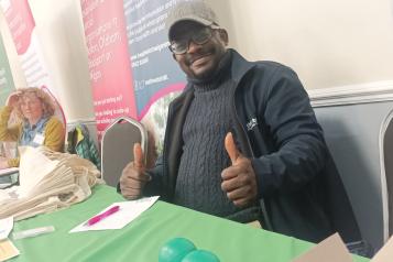 Yemi, looking slick and having fun at our stall